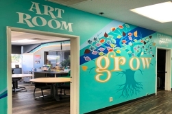 Colorful art room mural at the Oasis Clubhouse