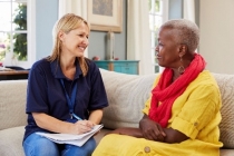 Case manager discussing with client