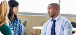 Clinician speaking with clients