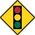 Yellow Warning Sign with a Traffic Signal