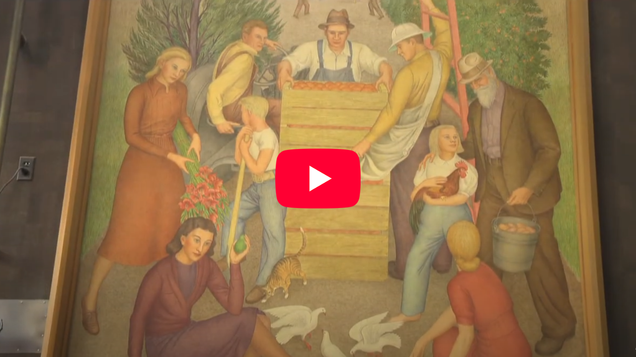 A historical 1939 mural of people doing various domestic and commercial activities common in the San Diego region