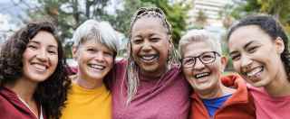 happy multigenerational and multicultural group of women