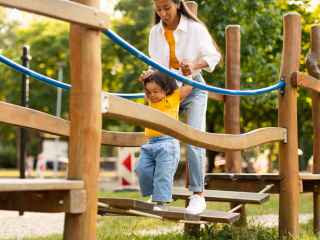 Mother with toddler at the playground