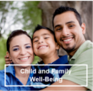 Family smiling at the park