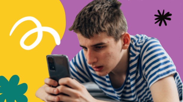 Teen boy on his cell phone