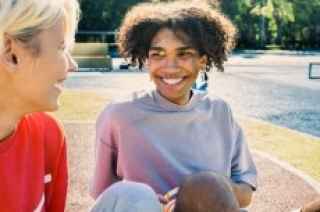 Youth smiling outside