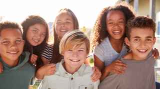 Group of elementary school kids smiling