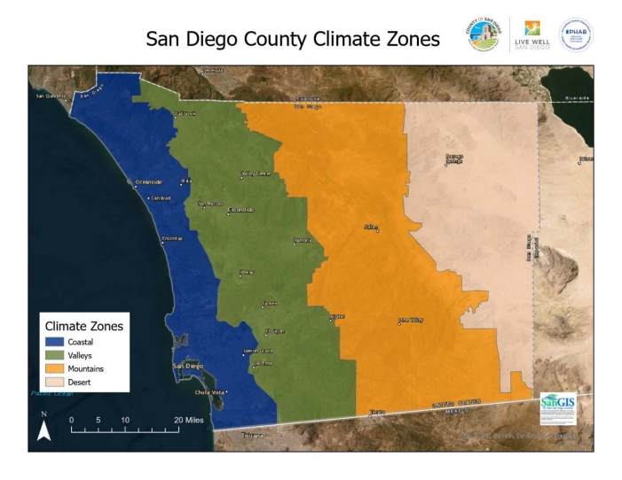 Image description: a map of San Diego County divided into four distinct climate zones. From west to east: coastal (dark blue), valleys (green), mountains (yellow), desert (tan). The climate zones extend the full north-south length of the county, paralleling the angle of the coastline, and the map is laid over a satellite image basemap of Southern California, trimmed to focus on San Diego County.