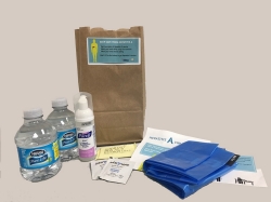 Hepatitis A hygiene kit which included hand sanitizer, cleansing wipes, bottled water, an informational flyer, and a waste bag.