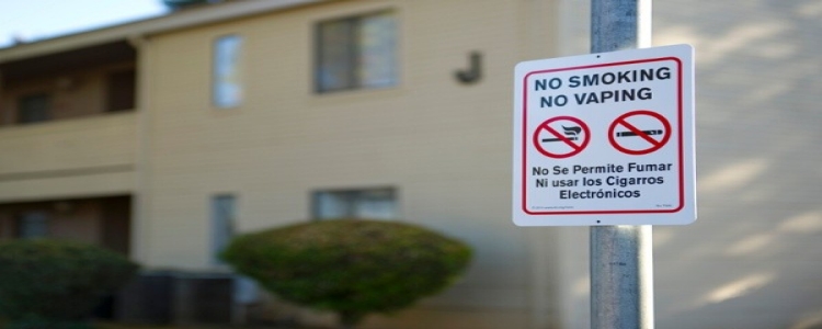 Smoke-Free Housing No smoking sign on apartment complex