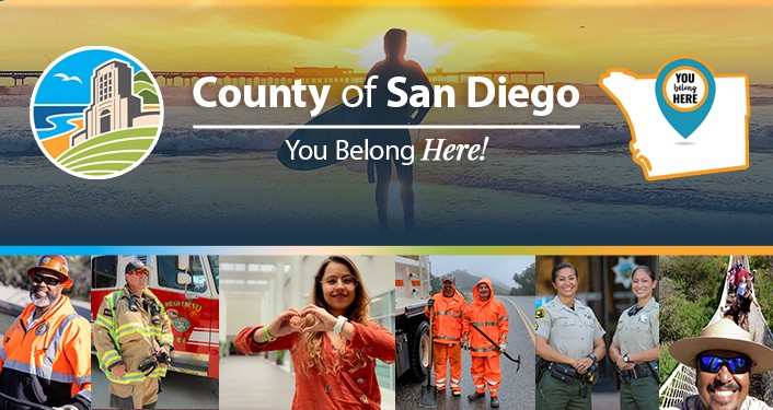 County of San Diego logo and county map with “You Belong Here!” over a surfer on the beach at sunset. Below is a collage of smiling County employees in various roles like road maintenance workers, a firefighter, a nurse, Sheriff’s deputies, and a park ranger