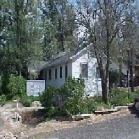 A building in Boulevard surrounded by trees