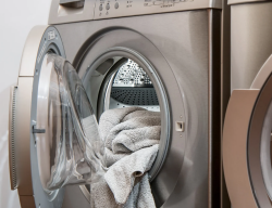 Clothes in an open washing machine.
