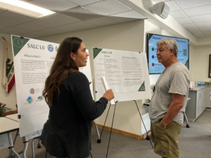 Picture of LAFCO staff speaking with a local producer