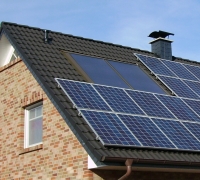 2024 Climate Action Plan Solar panels on home roof
