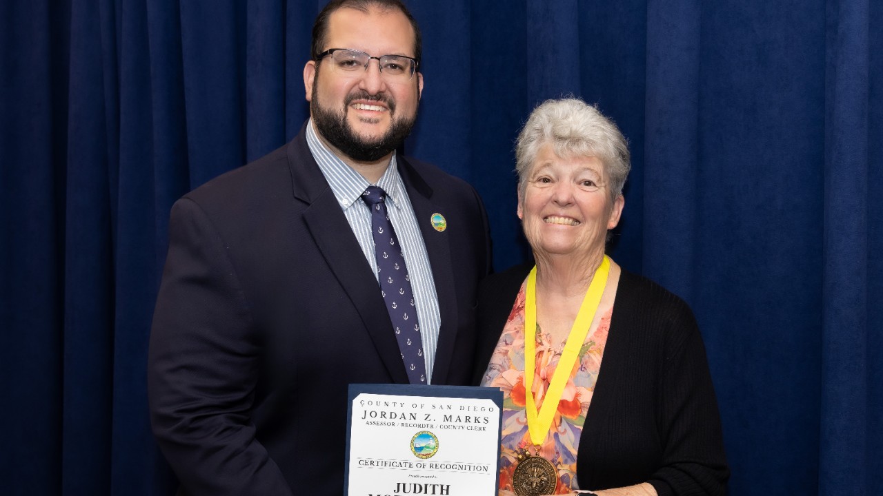 Volunteer receiving an award