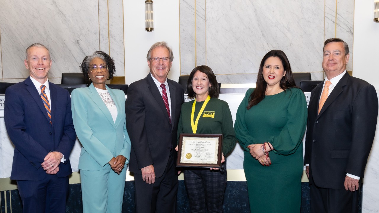 Group of volunteers posing for a photo