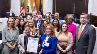 Volunteer coordinators accepting a proclamation from the Board of Supervisors.