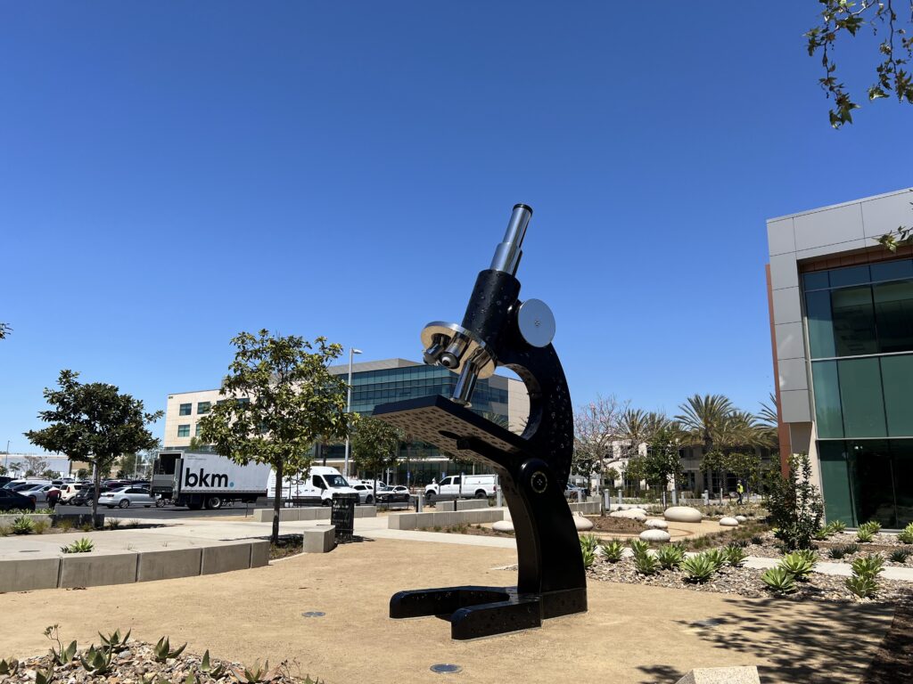 Sculpture that looks like12-foot-tall microscope.