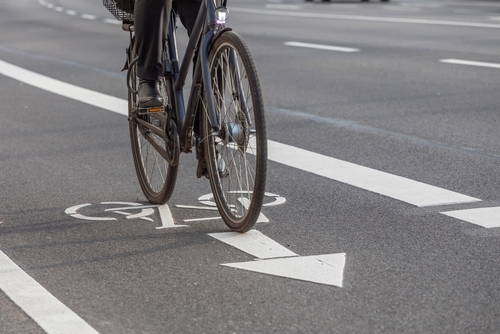 Bicycle traveling in a bike lane.